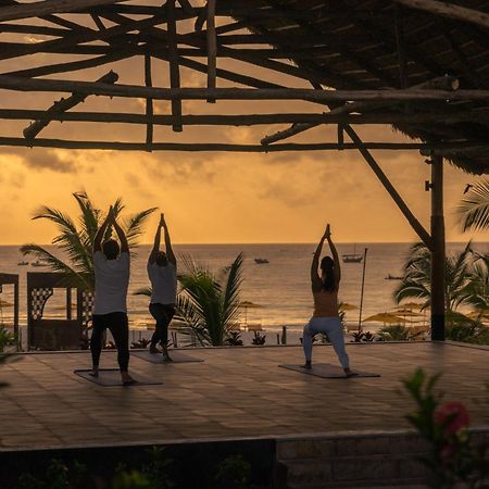 The Mora Zanzibar Hotel Matemwe  Eksteriør billede Sunset yoga at the beach
